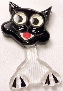 BP4 lucite/black bakelite googly cat pin